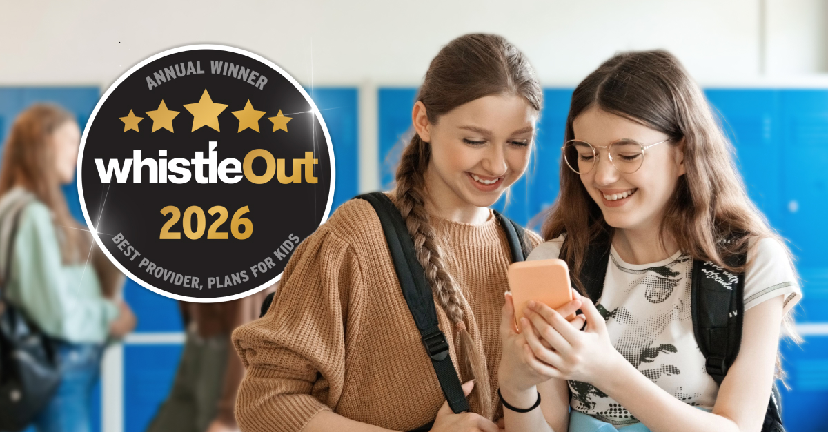 Two school students looking at a smartphone beside the WhistleOut 2026 Best Provider, Plans for Kids award badge.
